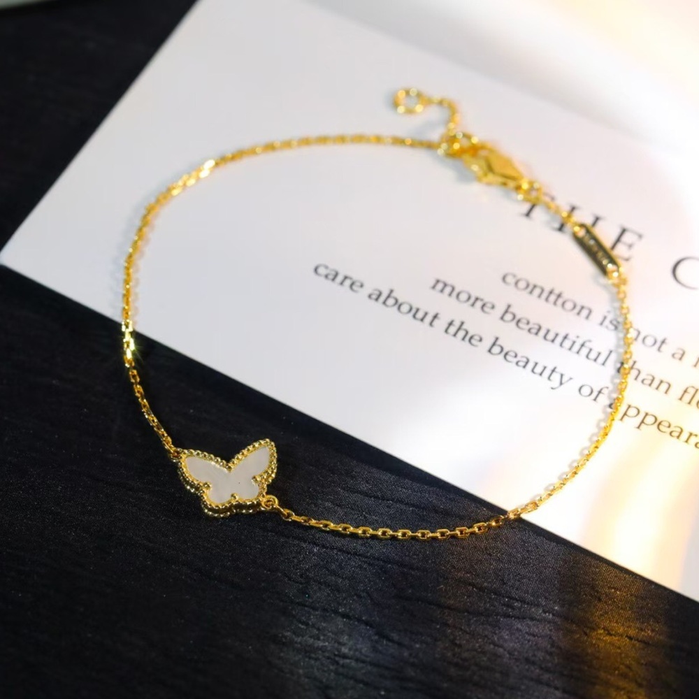 Bulgari Gold Bracelet with White Butterfly Charm